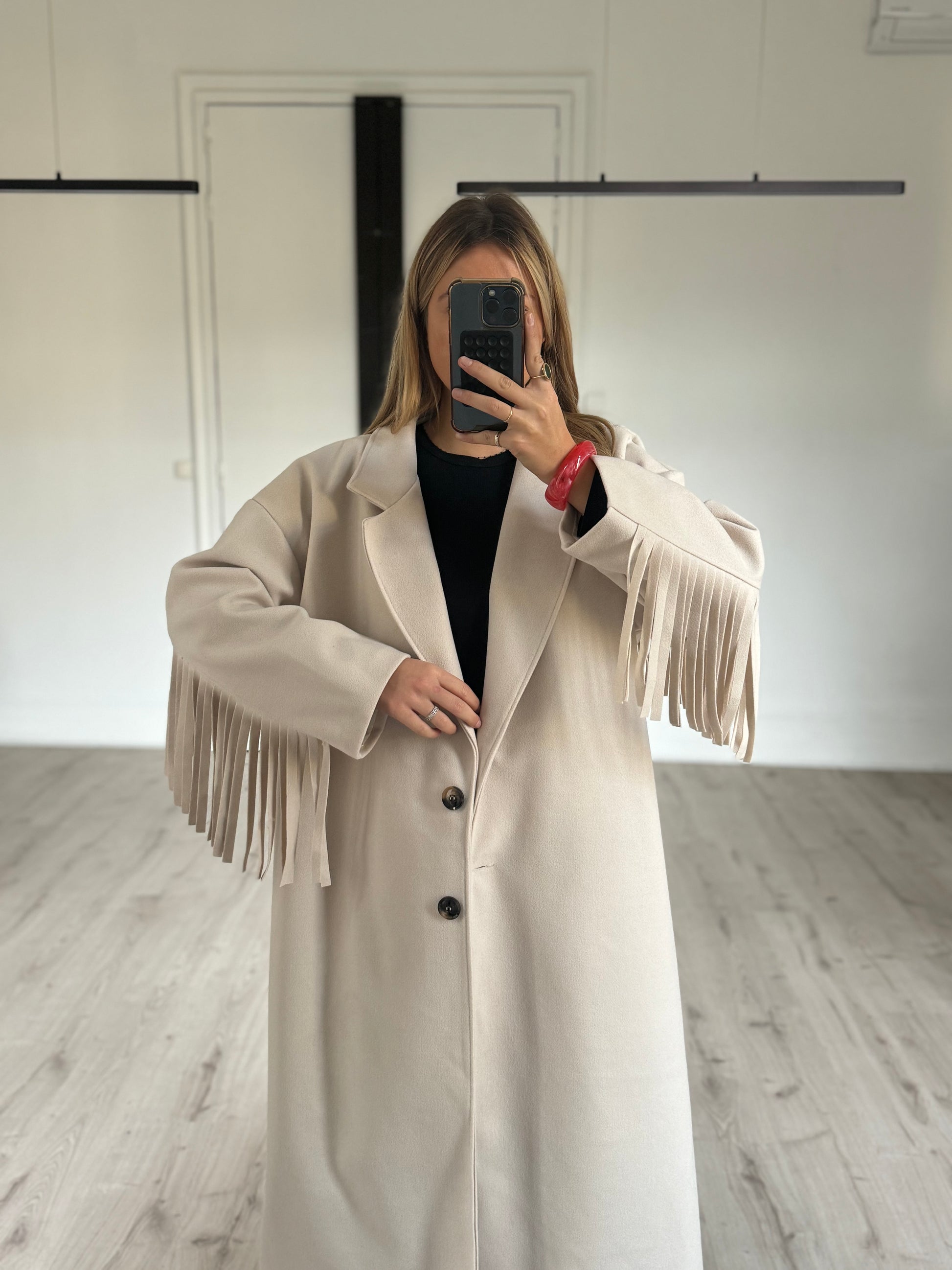 Manteau à franges