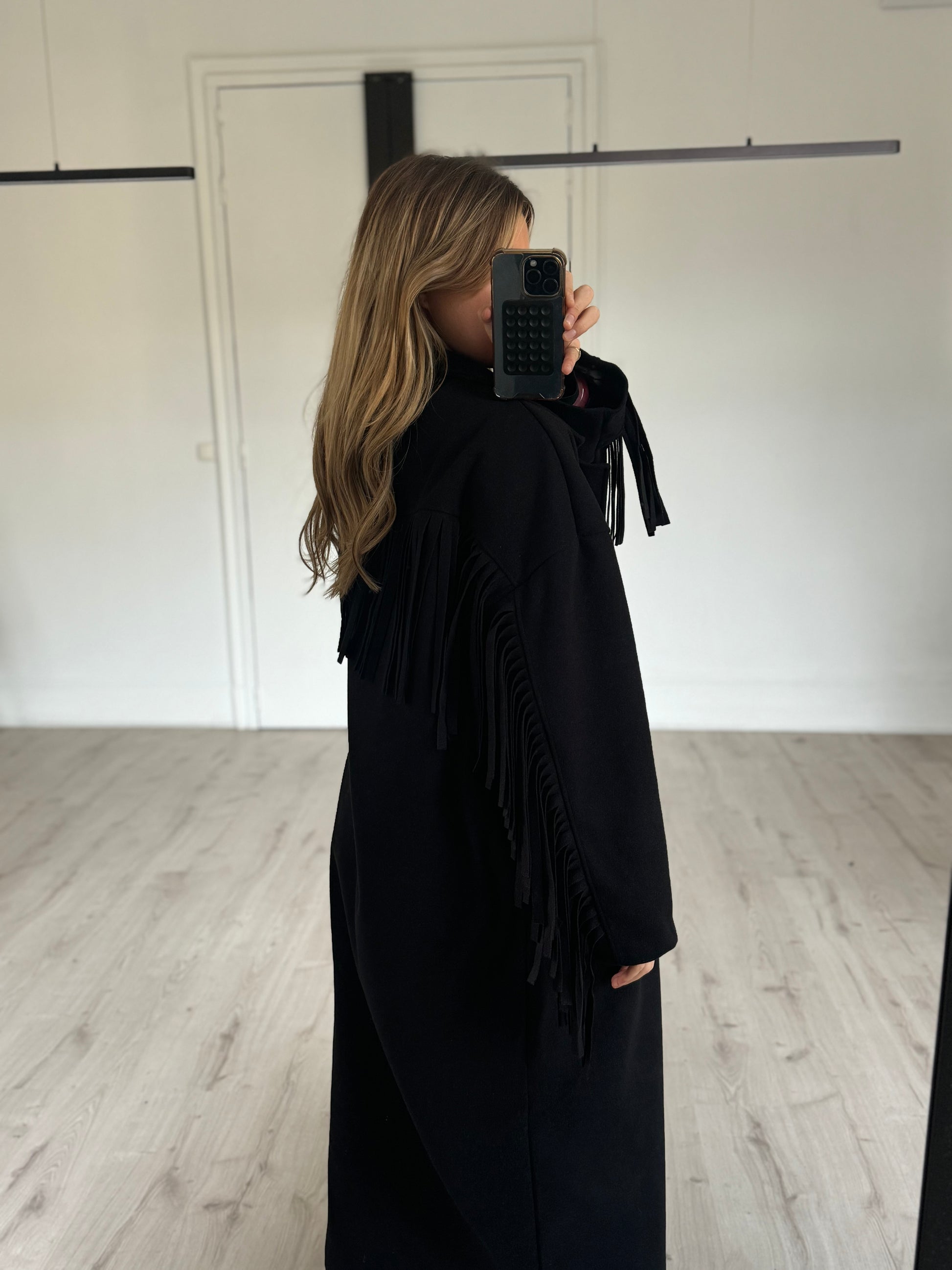 Manteau à franges